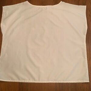 Cream sleeveless dressy shell